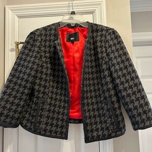 Gray and black houndstooth blazer.